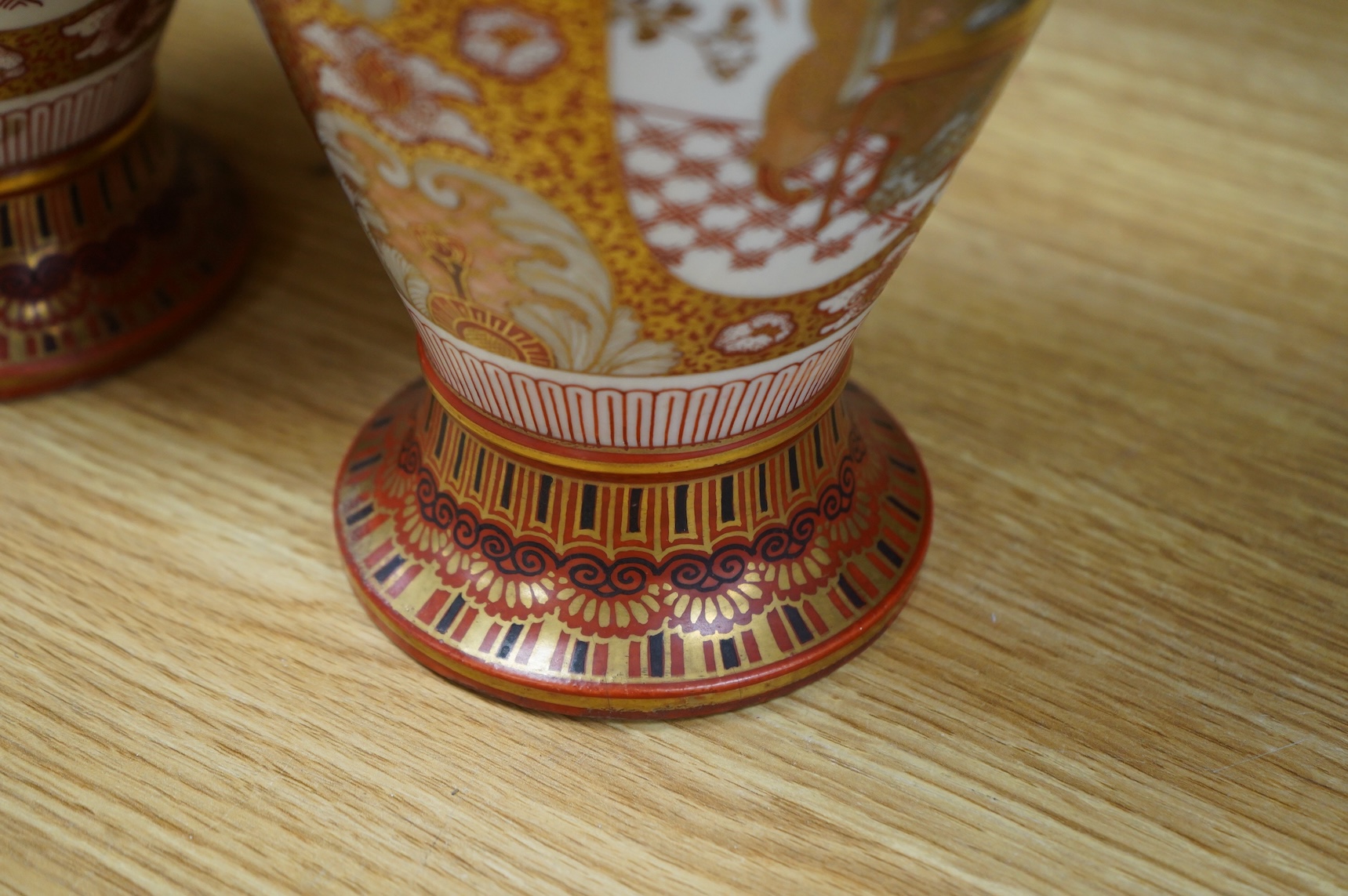 A pair of Japanese Kutani vases, signed, Meiji Period (1868-1912), 29cm
